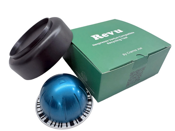 REVU tool removing the lid from a used Nespresso Vertuo capsule