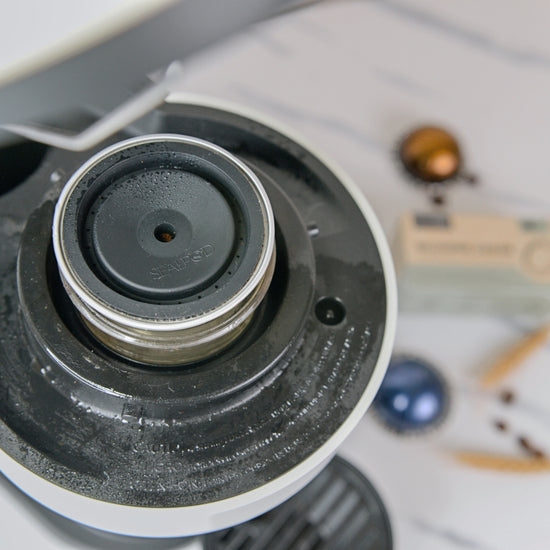 Sealpod reusable Vertuo lid in use with a Nespresso Vertuo machine